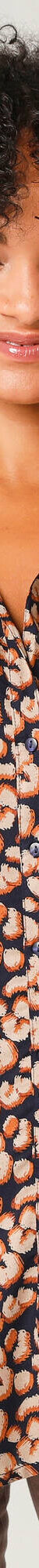 Uitlopende tuniek met knoopsluiting en dierenhuidprint (zwart / taupe) Uitlopende tuniek met knoopsluiting en dierenhuidprint (zwart / taupe)